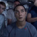 Anamaria Marinca, Daniel Wu, Michael Nyqvist and Sharlto Copley looking at a monitor in Europa Report