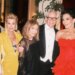 Kris Jenner looked like the ultimate Bond girl as she brandished a pistol at her 007-themed birthday party.