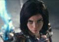 Rosa Salazar looks up defiantly while holding her sword skyward in Alita: Battle Angel.