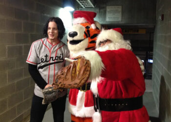 Jack White (with Detroit Tigers mascot Paws and Santa Claus) just before throwing out the ceremonial first pitch at Tigers game.