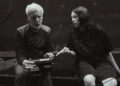 James Cameron directing actors on a giant pool on the set of Avatar: The Way of Water