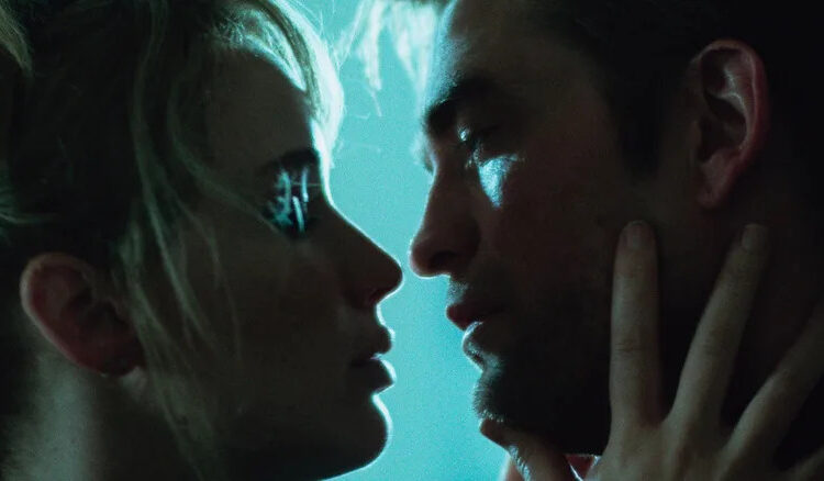 Grace touches Jackson's face leaning in to kiss in