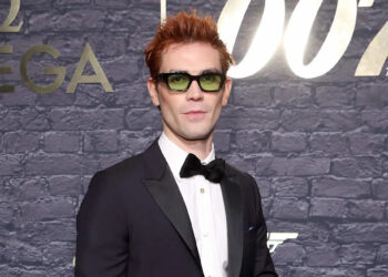 KJ Apa strips down & shows off his sexy body in new holiday movie