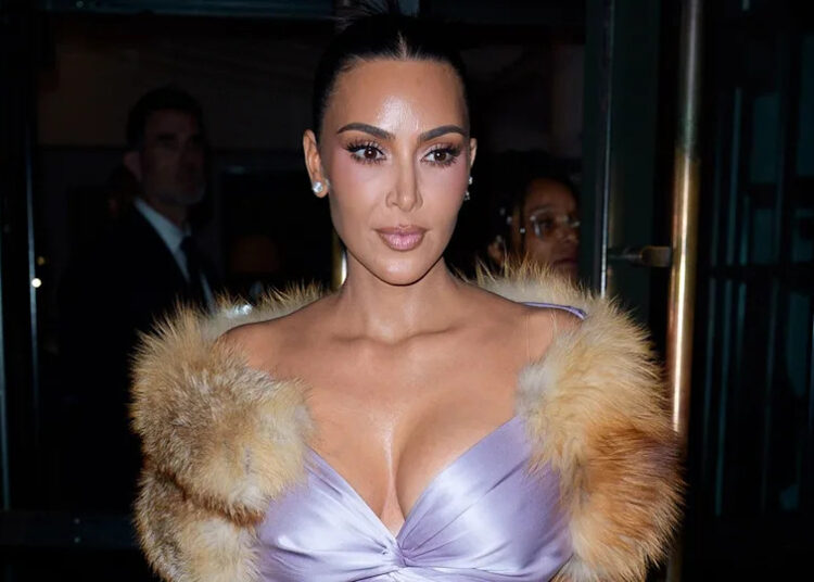 Kim Kardashian in a purple top while out in New York in October 2025.