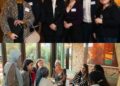 Princess Eugenie posing with a group of mentoring students at an event