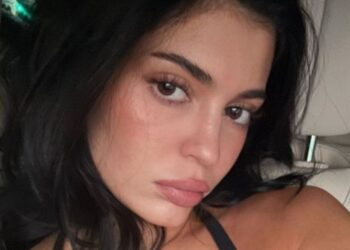 Kylie Jenner Posing in Just Blanket Is One of Her Boldest Photos Yet