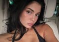 Kylie Jenner pouts at the camera in low cut top