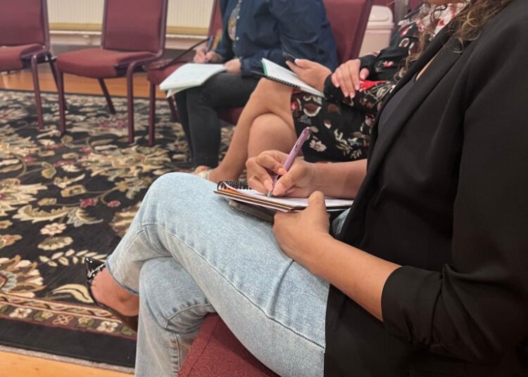 Telling Our Stories Workshop participants drafting their personal stories during the six-week series. (Courtesy photo)