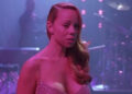 Billie Frank on stage looking sad in Glitter