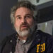 Tom Brandis wearing his FBI jacket in Task (2025)