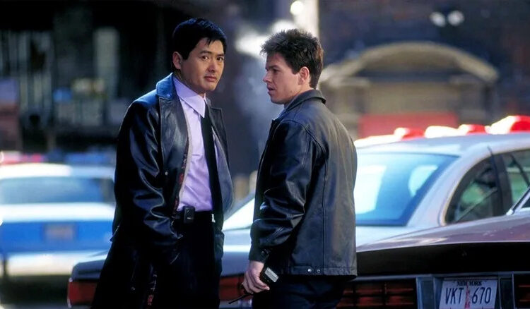 Chow Yun-fat looks cool in a leather jacked as Lieutenant Nick Chen while Mark Wahlberg looks scruffy as Detective Danny Wallace in The Corruptor