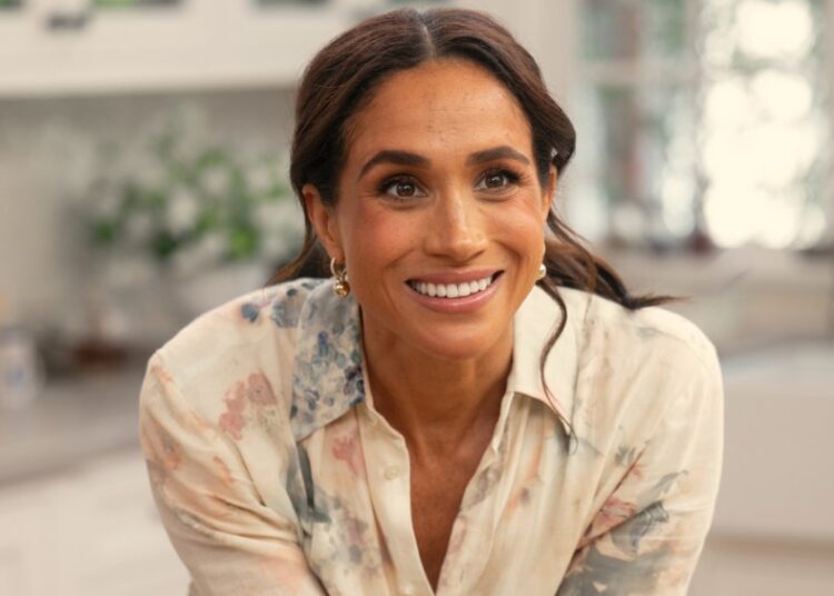 Meghan Markle Wears Galvan London Dress for Holiday Special Poster