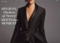 Meghan on the cover in a black suit