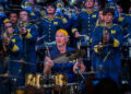 Chad Smith, center, performs with the University of Michigan Marching Band at Hill Auditorium in Ann Arbor, Michigan, on Nov. 2, 2025.