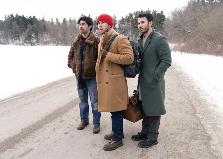 A VERY JONAS CHRISTMAS MOVIE, from left: Joe Jonas, Nick Jonas, Kevin Jonas, 2025. ph: John Medland / © Disney+ / Courtesy Everett Collection