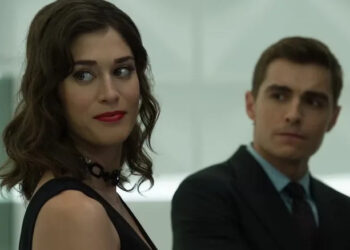 Lula looking over her shoulder and smirking with Jack behind her in Now You See Me 2