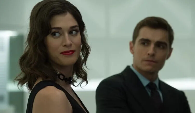 Lula looking over her shoulder and smirking with Jack behind her in Now You See Me 2