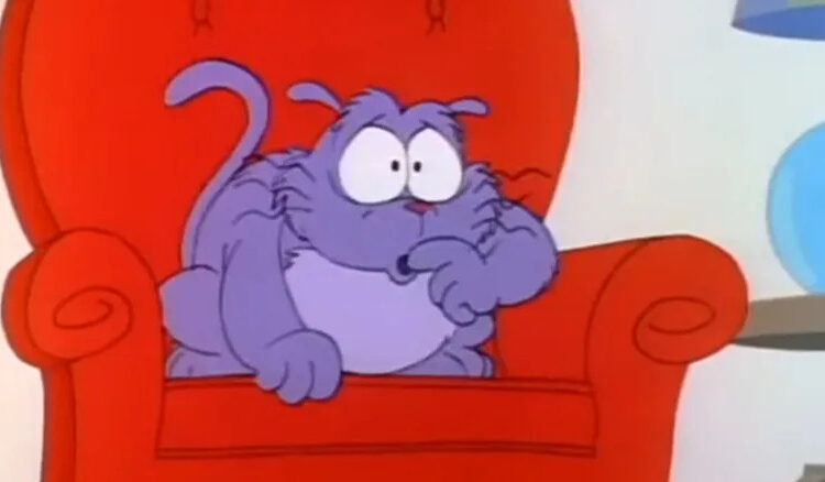 Eek! the cat on a big red chair watching TV on Eek! the Cat