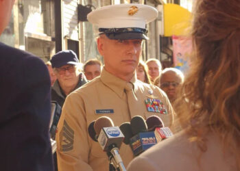 Gibbs at a press conference in his dress browns in "NCIS" (2003-present)