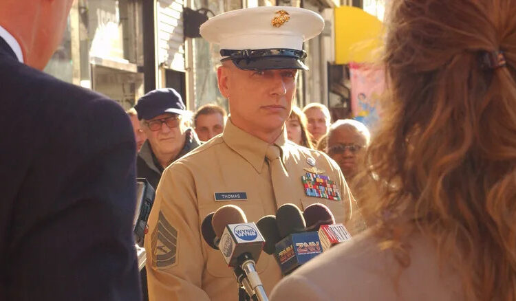 Gibbs at a press conference in his dress browns in "NCIS" (2003-present)