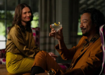 Karolina Wydra's Zosia and Samba Schutte's Koumba sitting and smiling on Pluribus