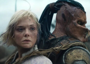 Synthetic android Thia (Elle Fanning, left) and Dek (Dimitrius Schuster-Koloamatangi) help each other on their quests in "Predator: Badlands."