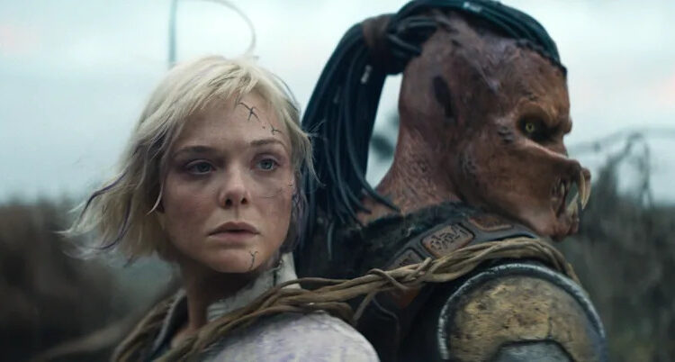 Synthetic android Thia (Elle Fanning, left) and Dek (Dimitrius Schuster-Koloamatangi) help each other on their quests in "Predator: Badlands."