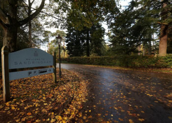 Signage is pictured near the entrance to the Sandringham Estate, where Prince Andrew will move following King Charles III's decision to strip him of his title of prince and evict him from his Windsor residence.
