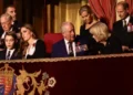 PA Media Prince George, Princess Catherine, King Charles and Queen Camilla are pictured sat in the front row of a royal box.