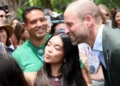 PA Media Prince William and a woman taking a selfie