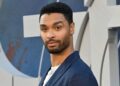 Regé-Jean Page strips down & flexes his six-pack in new film