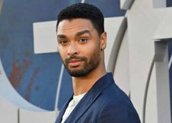 Regé-Jean Page strips down & flexes his six-pack in new film