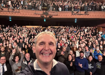 "Somebody Feed Phil" host Phil Rosenthal doing a selfie at one of his shows on his Fall 2025 tour.