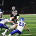 Lincoln Moore runs the ball for Kentlake. Ben Ray / The Reporter