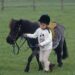 A young Prince William and his Shetland pony