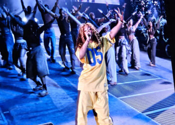 SZA performs at Ford Field in Detroit on June 10, 2025, as part of the Grand National Tour.
