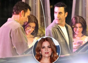 Sacha Baron Cohen cozies up to influencer half his age for club outing