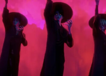 The Saja Boys perform against a red background in KPop Demon Hunters