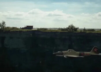 A truck being chased by a plane in Sisu: Road to Revenge