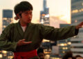 Ben Wang as Li Fong practicing his movies on a rooftop in Karate Kid: Legends