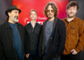 Soundgarden members Kim Thayil, Matt Cameron, Chris Cornell and Ben Shepherd standing in a line.
