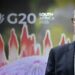 Sir Keir Starmer spoke to reporters on his way to the G20 in South Africa. Pic: Reuters