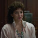 Sydney Sweeney with brunette perm as Christy .