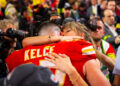 Kansas City Chiefs tight end Travis Kelce (87) celebrates with fiancee Taylor Swift.© Mark J&period; Rebilas-Imagn Images