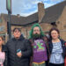 Five people standing in front of a derelict pub, the Lincoln Imp. There are three women, one man and a girl.