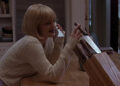 Drew Barrymore as Casey toying with a knife on the phone in Scream (1996)