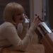 Drew Barrymore as Casey toying with a knife on the phone in Scream (1996)