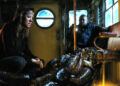 Mira Sorvino's Dr. Susan Tyler looking at the monster in Mimic