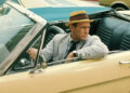 Carl Kolchak sitting in a car on Kolchak: The Night Stalker