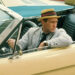 Carl Kolchak sitting in a car on Kolchak: The Night Stalker